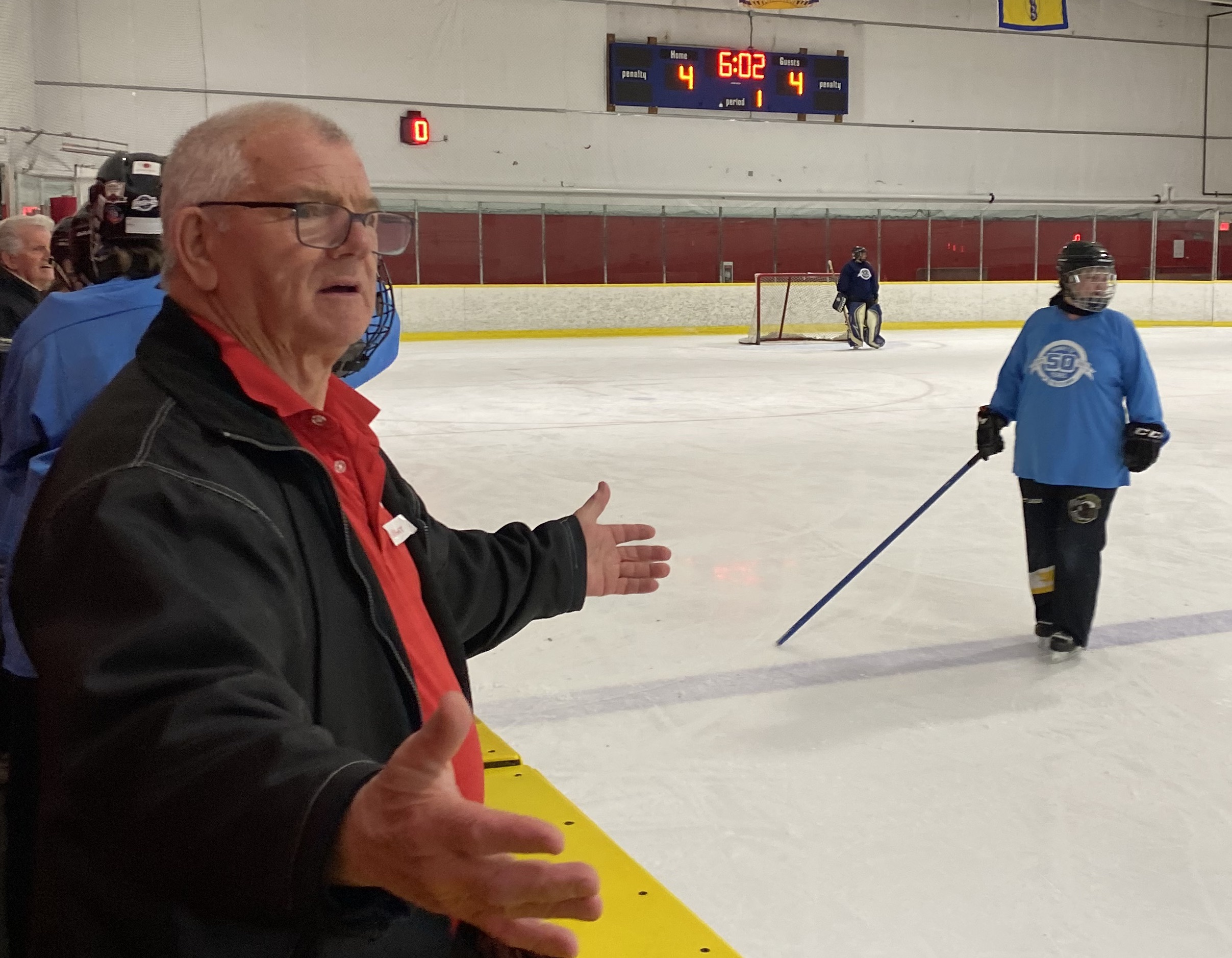Jim Wright coaching at the 2024 ringette alumni games
